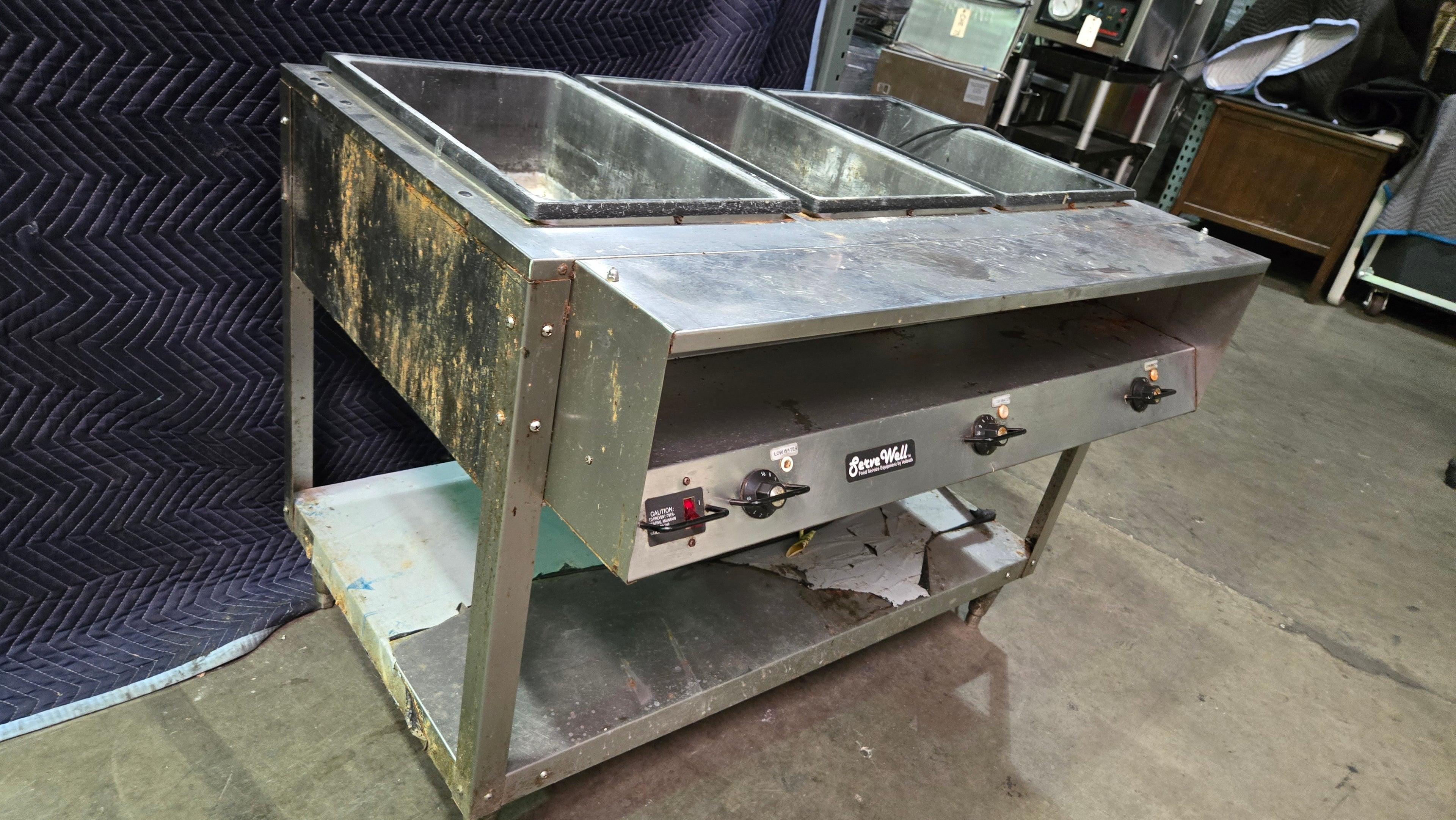 Vollrath 38003 Steam Table, 3-Well Electric On Stand, Lower Shelf