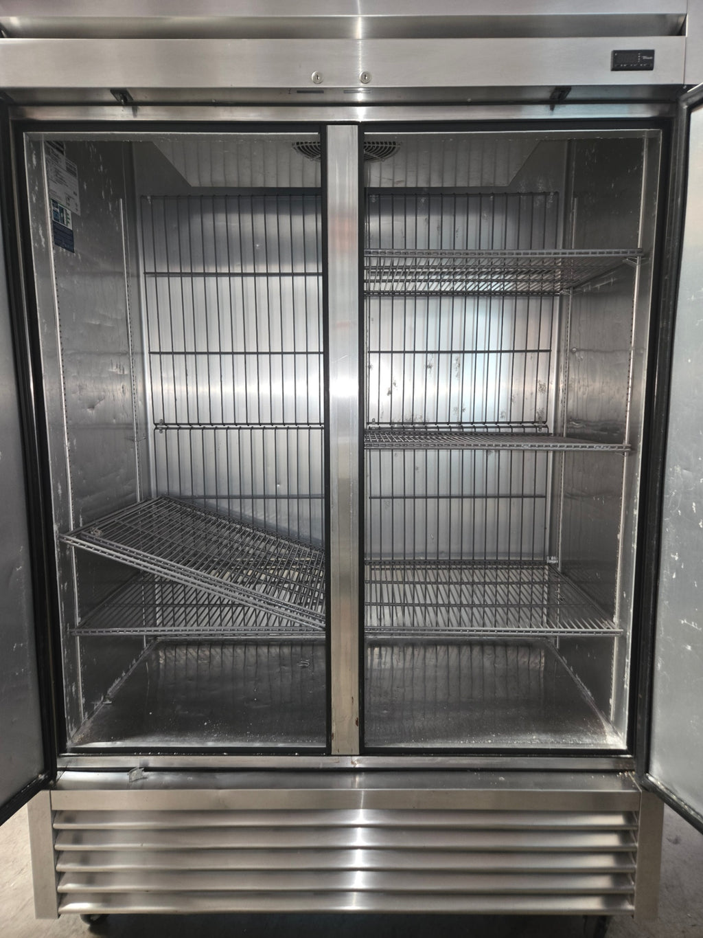 True Commercial Reach-in Unit With A Stainless Steel Exterior With Two Solid Swing Doors