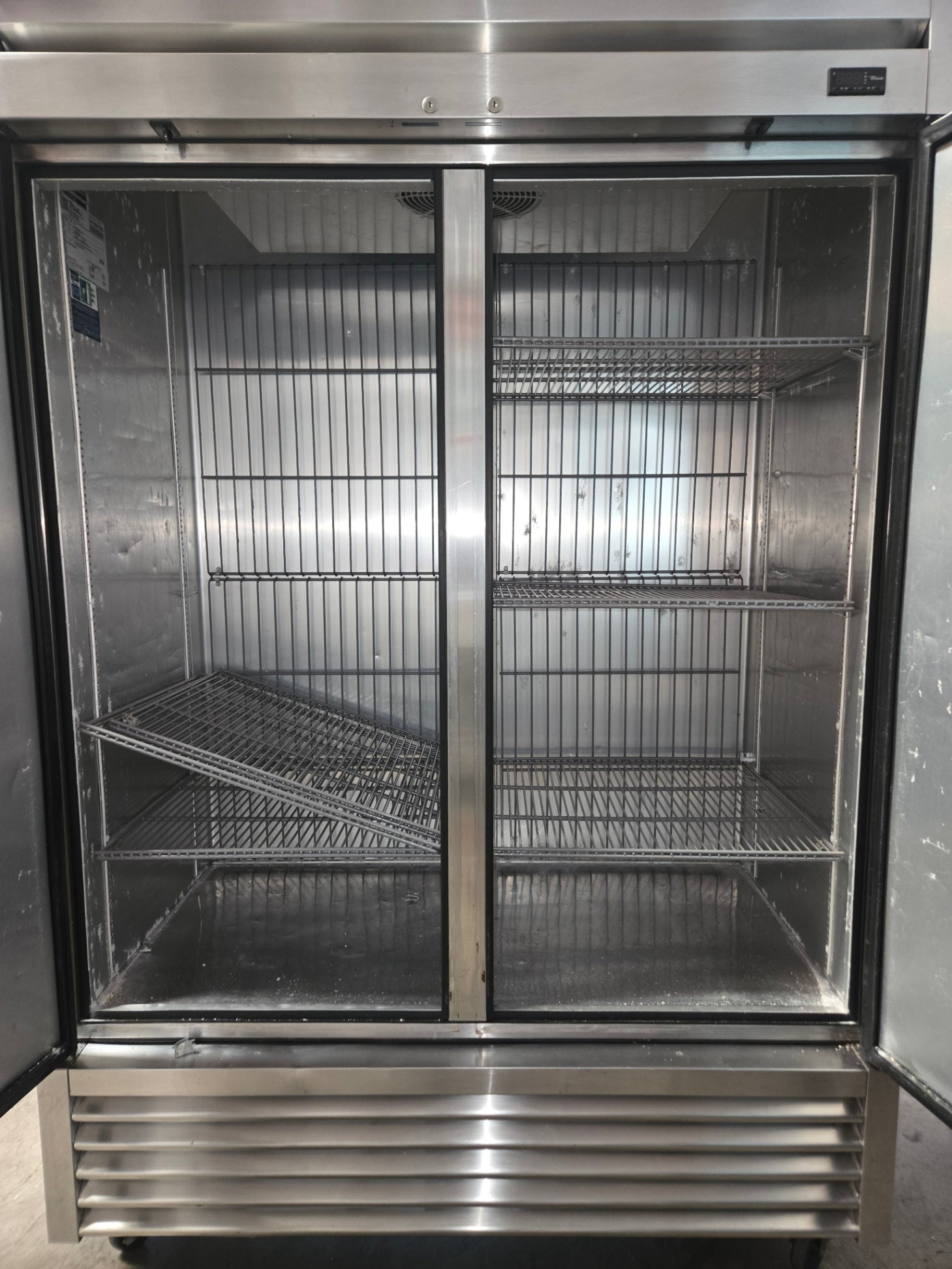 True Commercial Reach-in Unit With A Stainless Steel Exterior With Two Solid Swing Doors