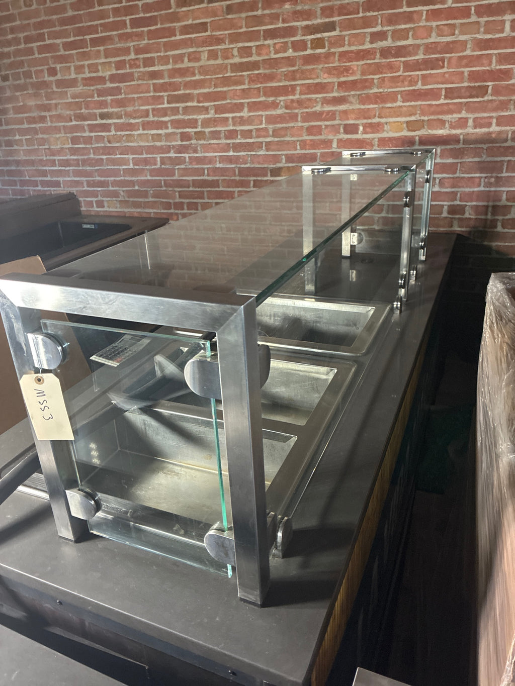 Partners By Design 01-02062528 Action Station, 2 Hot Wells, 1 Cold Well, Sneeze Guard W/ Register Station, Under Storage, Mobile