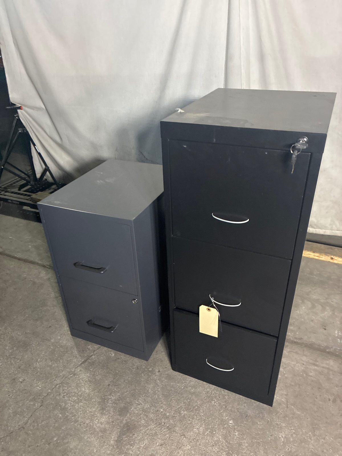 Assorted File Cabinets, 1: 2 Drawer 24”, 1: 3 Drawer 47.25” - Lot Of 2