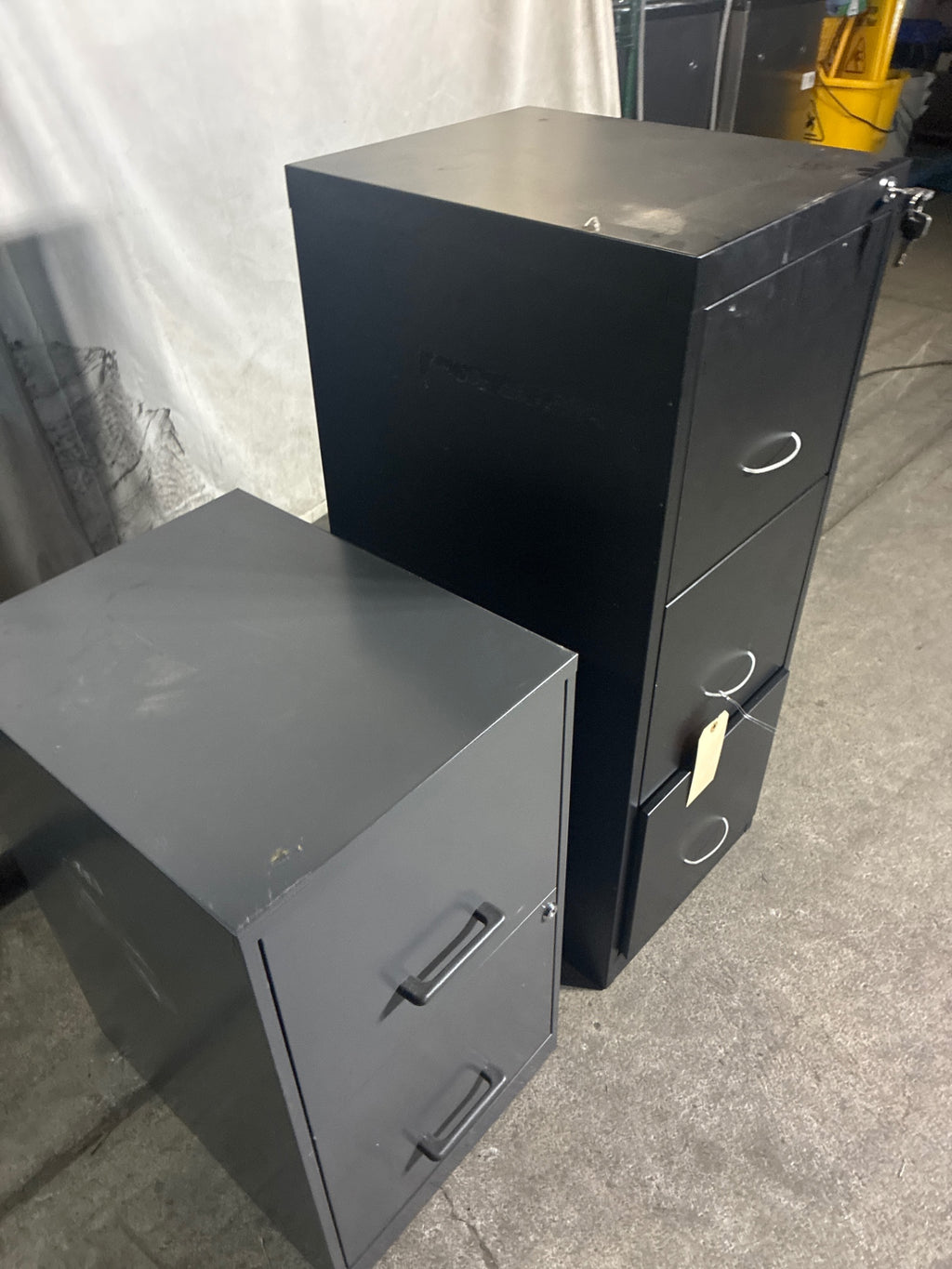 Assorted File Cabinets, 1: 2 Drawer 24”, 1: 3 Drawer 47.25” - Lot Of 2