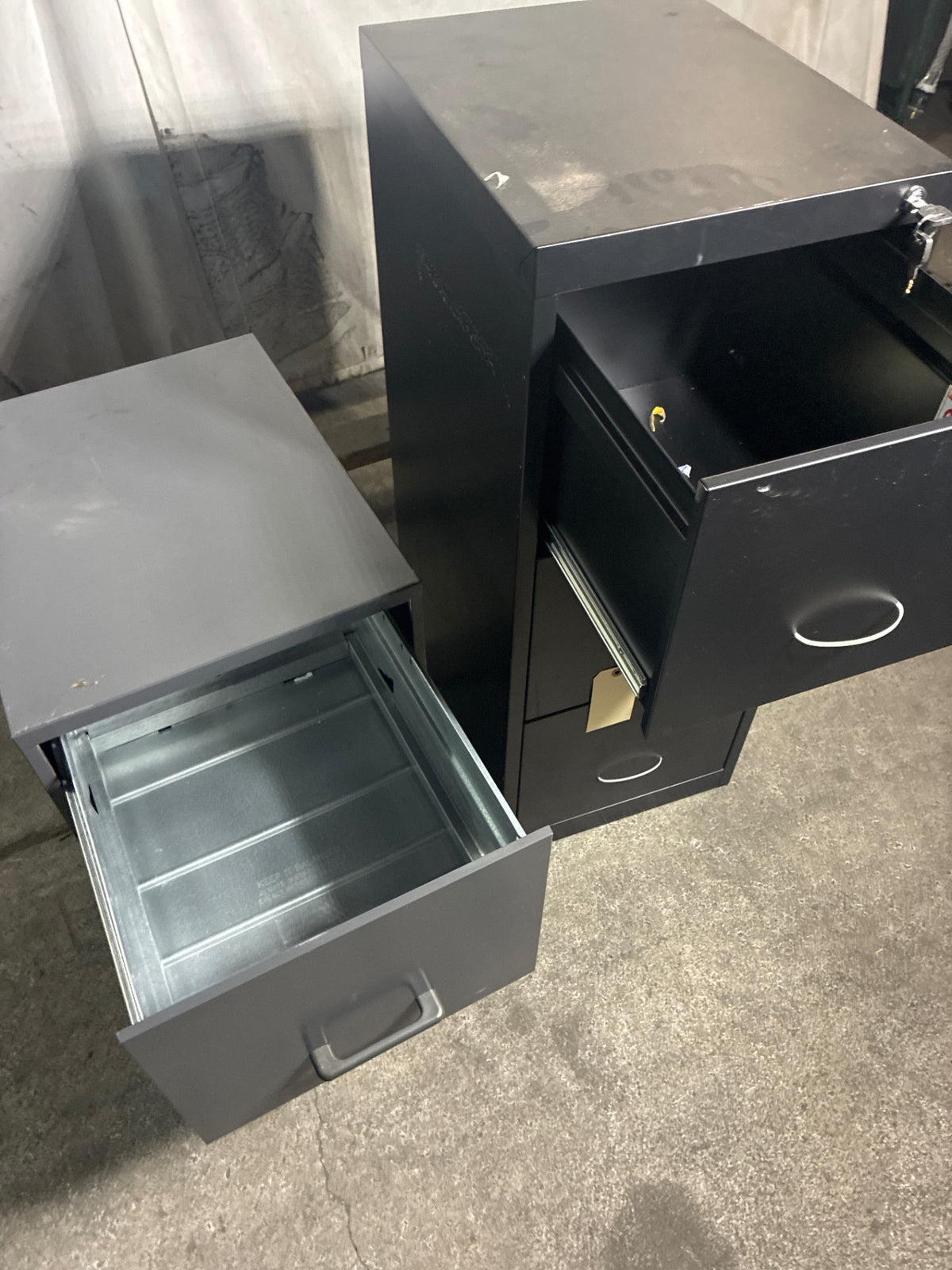Assorted File Cabinets, 1: 2 Drawer 24”, 1: 3 Drawer 47.25” - Lot Of 2