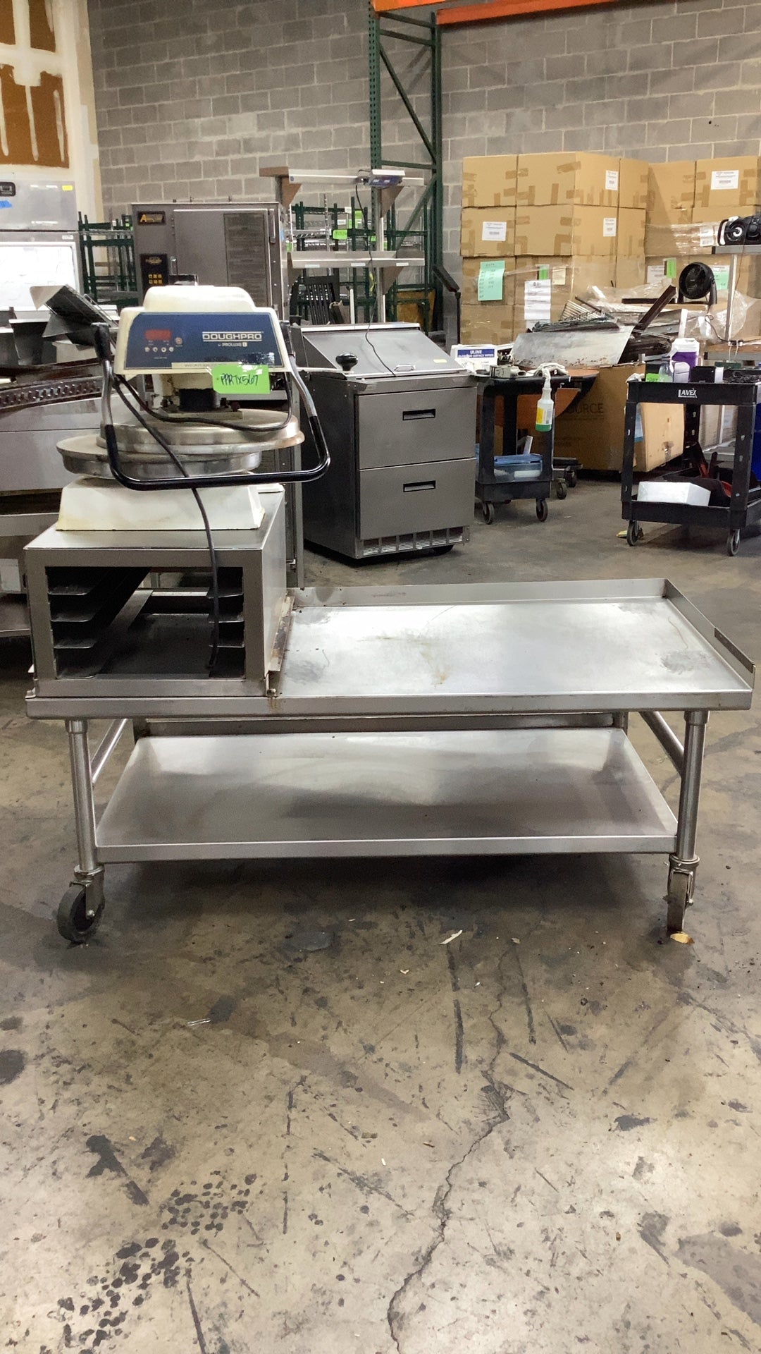 Doughpro DP1100 Dough Press On Stainless Steel Work Table