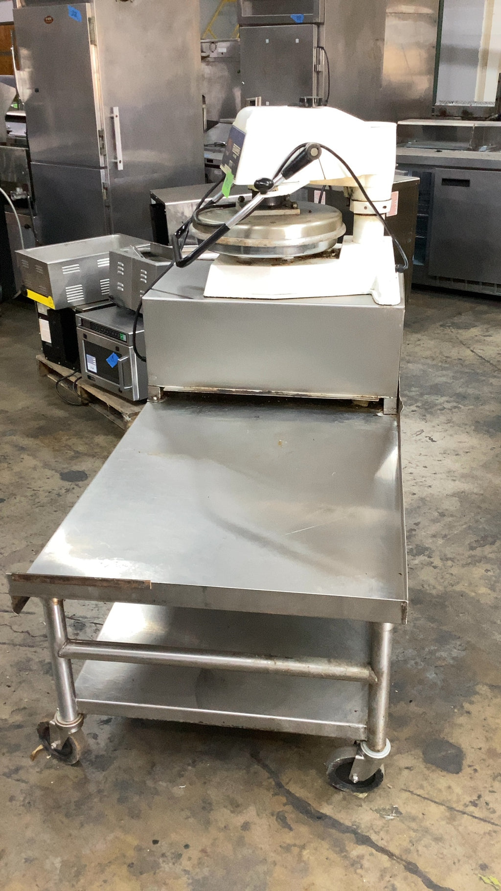 Doughpro DP1100 Dough Press On Stainless Steel Work Table