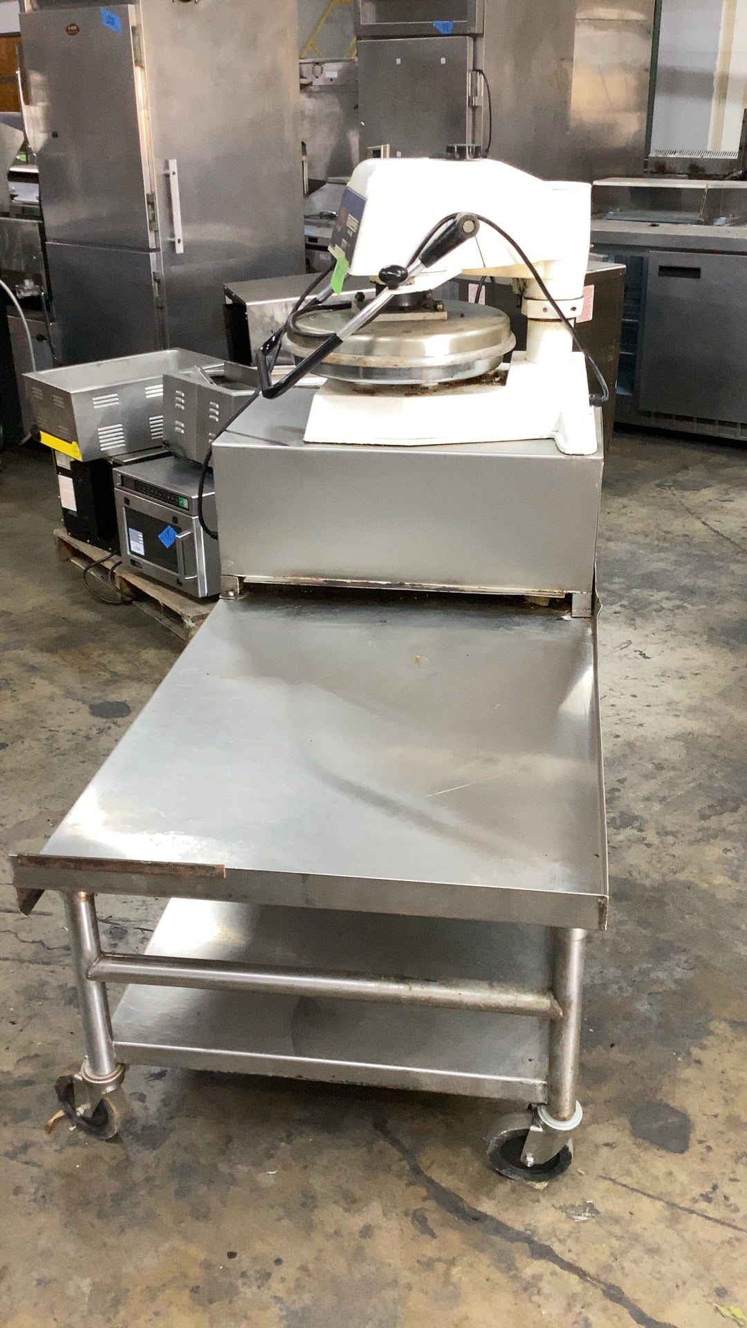 Doughpro DP1100 Dough Press On Stainless Steel Work Table
