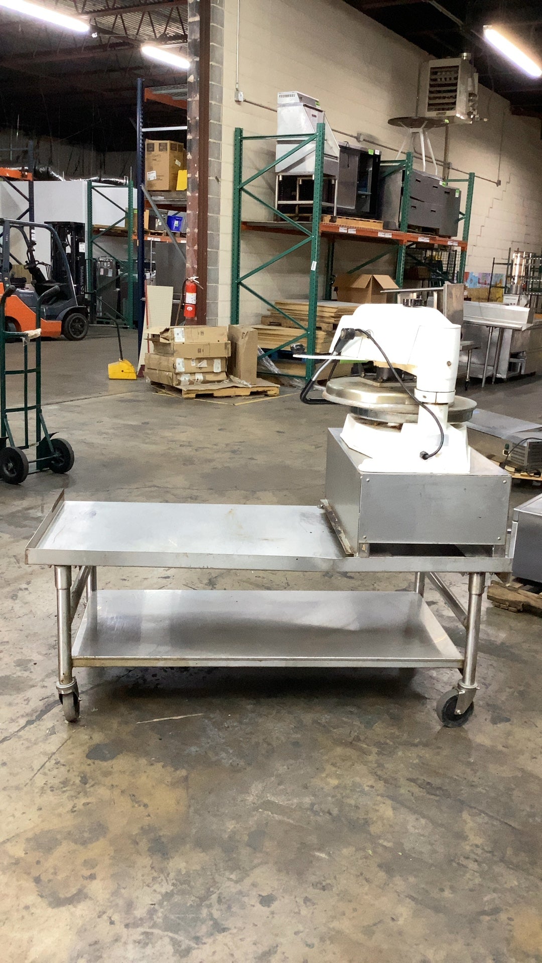Doughpro DP1100 Dough Press On Stainless Steel Work Table