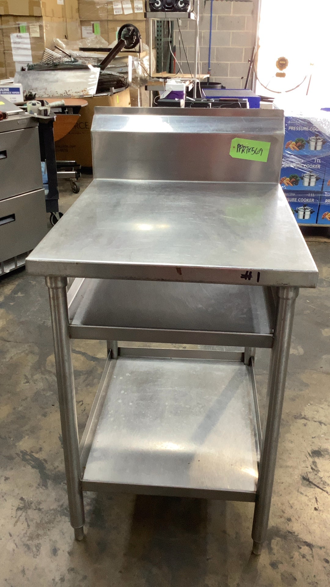 Stainless Steel Two Shelf Table With Backsplash
