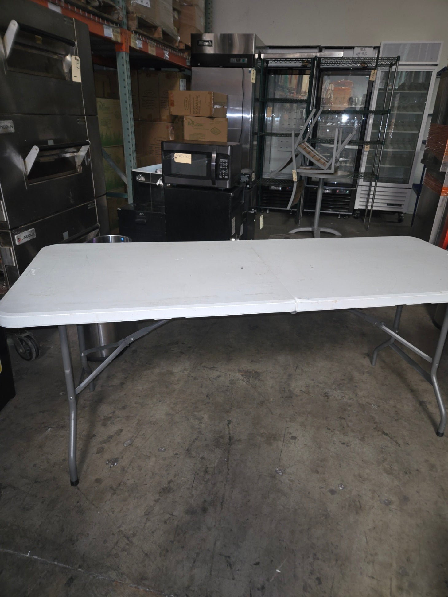72x30 Folding Table, Rectangular White Top. 2 White Plastic Folding Chairs