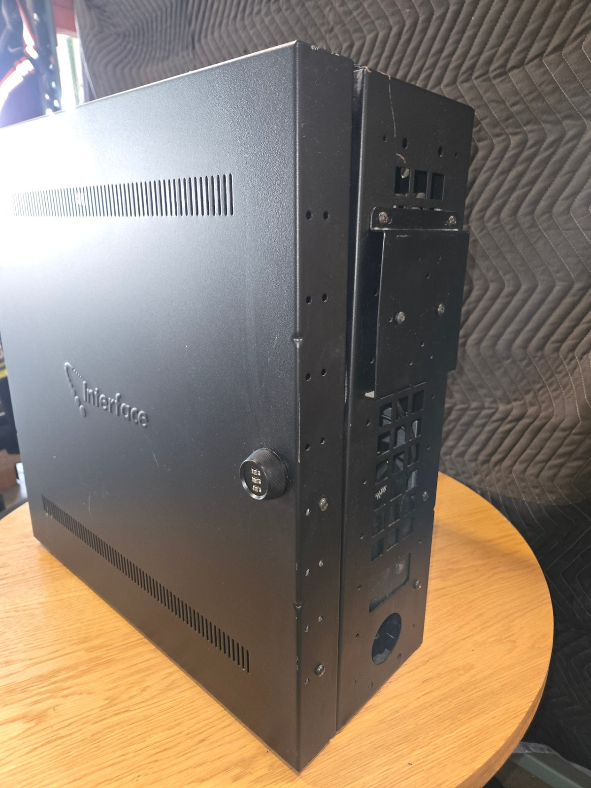 Interface Black, Rectangular Metal Electronic Equipment Enclosure Or Rack-mount Chassis Featuring Ventilation Slots