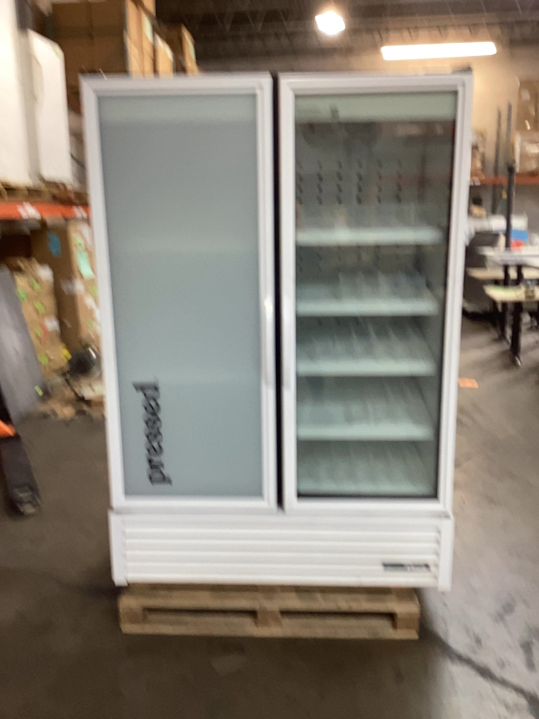 True FLM-54 - TSL01 Display Refrigerator, Upright Two-Door One Frosted Door One Glass Swing Door.