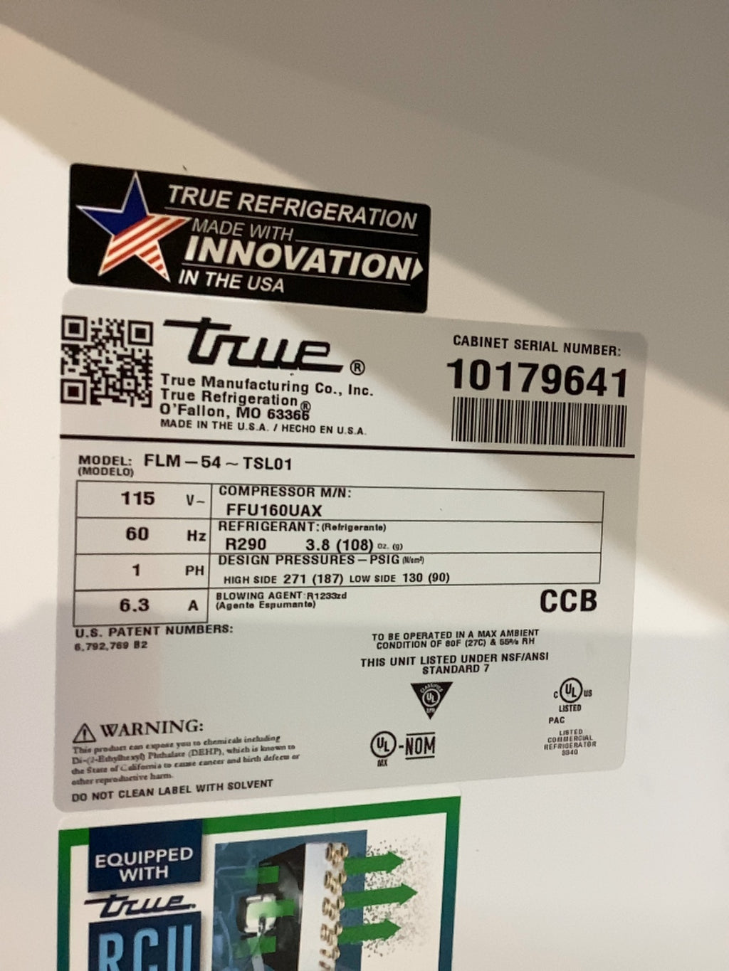 True FLM-54 - TSL01 Display Refrigerator, Upright Two-Door One Frosted Door One Glass Swing Door.