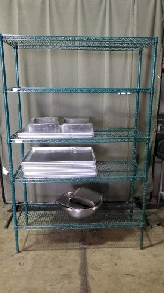Green Wire Rack Shelving Unit With Miscellaneous Kitchen Items