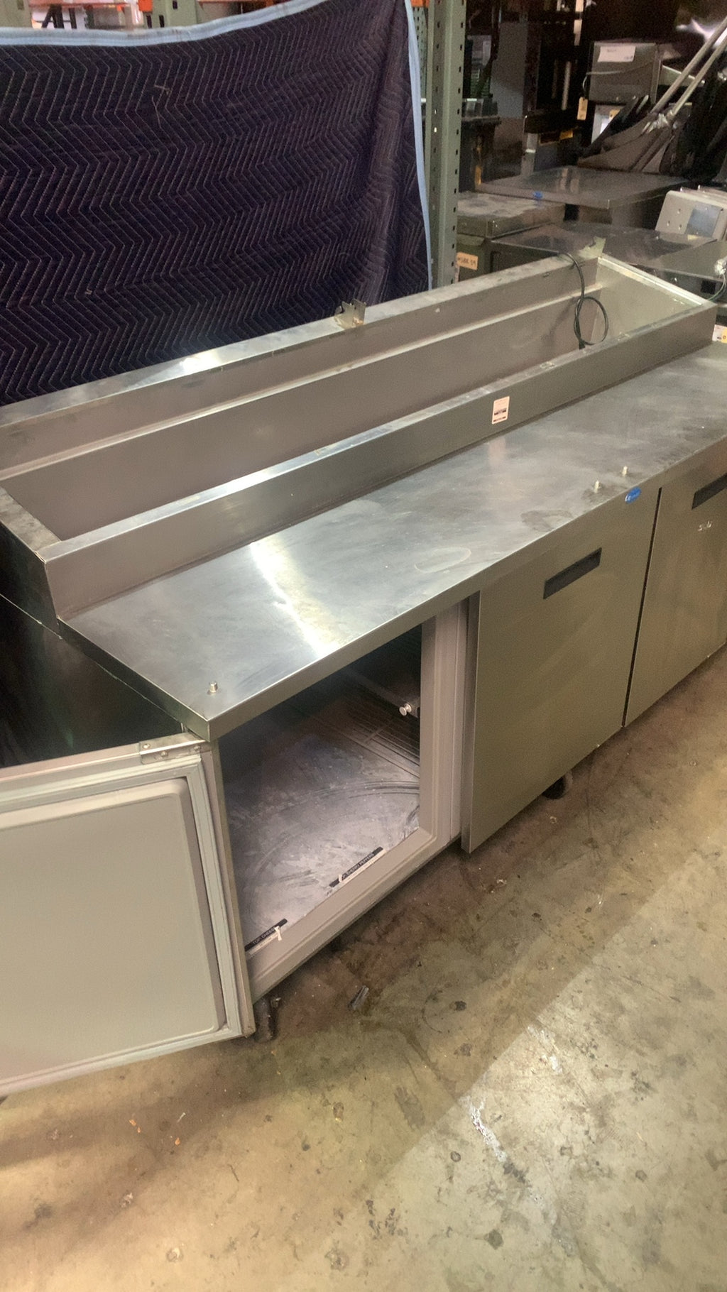 Randell 8383N-290 Salad/Sandwich Prep Table, Raised Rail, Four Door Stainless Steel, On Casters, Adjustable Shelves
