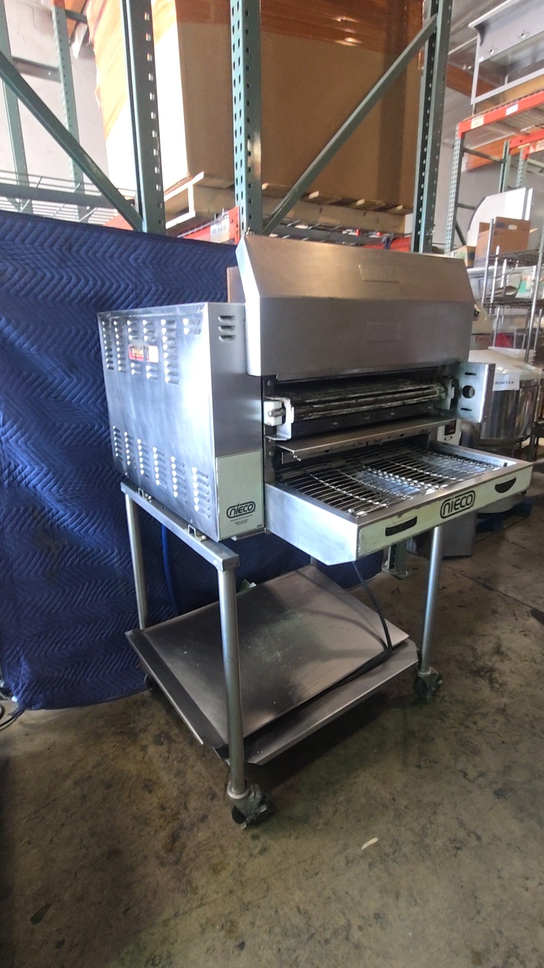 NIECO JF14G Conveyor Broiler, Gas 220V 1PH 12Amp Electric, Natural Gas, Stainless Steel, On Mobile Stand with Casters