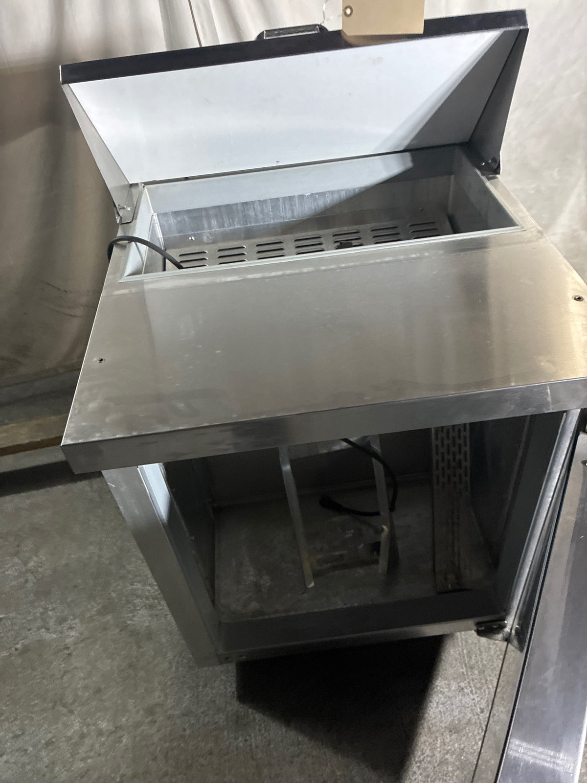 Continental SW27-8 Sandwich Prep Table, Single Solid Swing Door, Stainless, Mobile