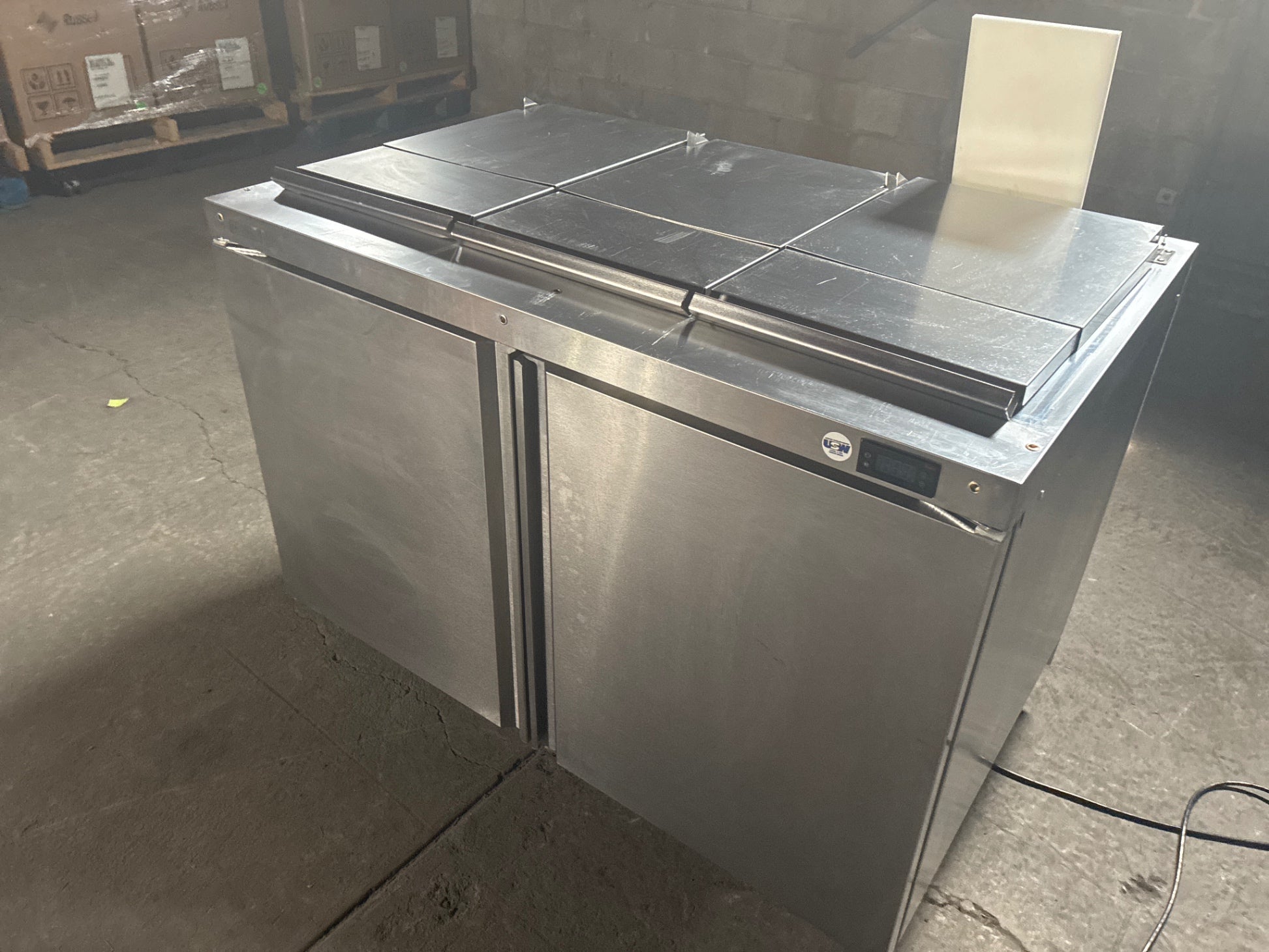 Delfield 4448NP-18M-A1454 Sandwich Prep Table, 3 Wells, 2 Solid Swing Doors, Stainless, Mobile